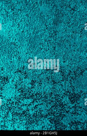 Rusty metal wall, old sheet of iron covered with rust with multi-colored paint vertical background texture. Stock Photo
