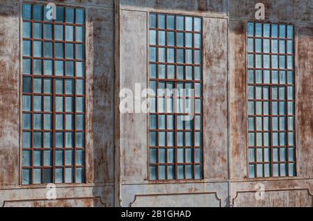 three windows of abbandoned airport in Gorizia Italy Stock Photo