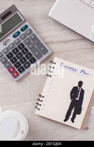 Calculator and notepad close up. Stock Photo