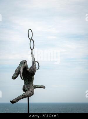 monument to the hare on the water, standing on stilts against blue sky Stock Photo