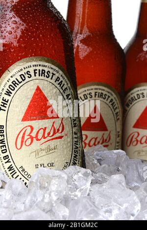 IRVINE, CA - MAY 30, 2014: Closeup 0f Bass Pale Ale bottles in ice. The Bass Brewery was founded in 1777 by William Bass, in Trent, England is now own Stock Photo