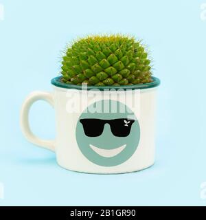 Cactus grown recycled tin mug with eco green emoji  cool face, fun quirky eco reuse, upcycle zero waste concept