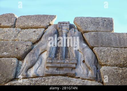 Closeup of headless lions on the Lion Gate that was the main entrance of the Bronze Age citadel of Mycenae in southern Greece Stock Photo