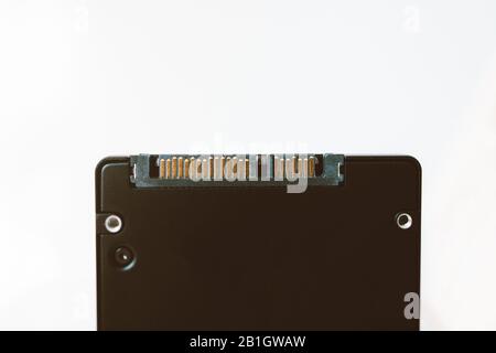 Contacts of modern SATA fast interface of new SSD solid state drive disk against white background Stock Photo