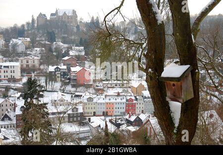 Bird house in winter with the panoramic view on Marburg in Germany Stock Photo