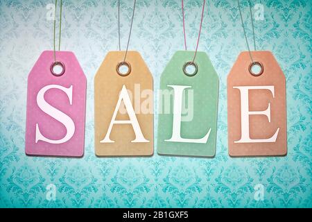 3D computer graphic, symbolic text lettering SALE against green background, Europe, Germany, Bavaria Stock Photo