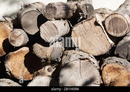 small logs stacked on top of each other Stock Photo