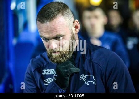 London, UK. 25th Feb, 2020. Wayne Rooney of Derby County looks on before the game. EFL Skybet Championship match, Queens Park Rangers v Derby County at The Kiyan Prince Foundation Stadium, Loftus Road in London on Tuesday 25th February 2020. this image may only be used for Editorial purposes. Editorial use only, license required for commercial use. No use in betting, games or a single club/league/player publications. pic by Tom Smeeth/Andrew Orchard sports photography/Alamy Live news Credit: Andrew Orchard sports photography/Alamy Live News Stock Photo