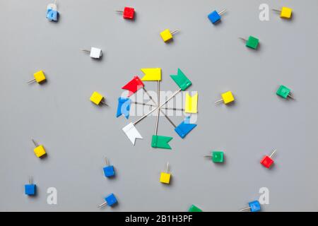 Colorful push pins isolate on gray background Stock Photo