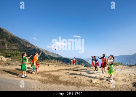 Ta Xua, Son La province, Vietnam - January 21, 2020: H'mong children play handball in Son La, Vietnam. At the time of the Lunar New Year at the end of Stock Photo