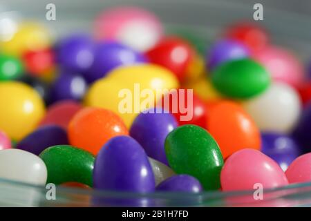 Close-up view of a bowl full of colorful jelly beans Stock Photo