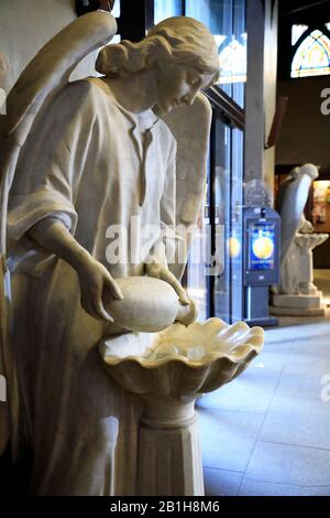 Religious sculptures inside of Saint Jean de Montmartre church or Eglise Saint Jean de Montmartre in Montmartre.Paris.France Stock Photo