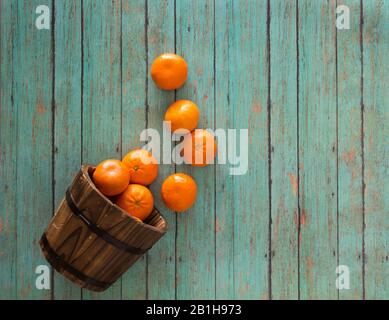 oranges on wood bucket Stock Photo