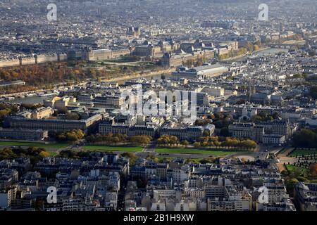 The view of Louvre Museum at Right Bank of River Seine with cityscape of Left Bank in foreground.Paris.France Stock Photo