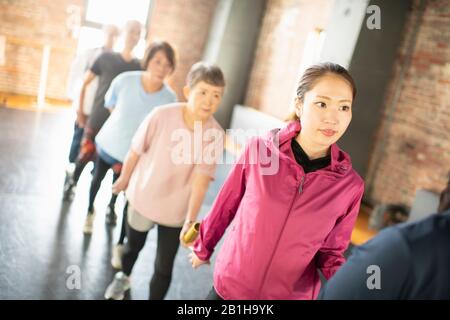 Passing baton over generations Stock Photo