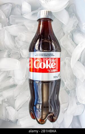 A plastic bottle of a diet Coke in a bed of ice Stock Photo