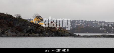 Scenes of colourful houses and islands on the ferry, Oslo, Norway Stock Photo