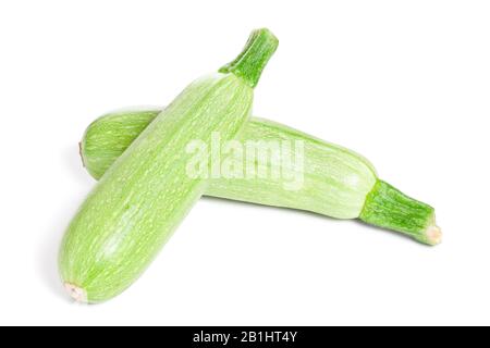 Two Green fresh Zucchini isolated on white background Stock Photo