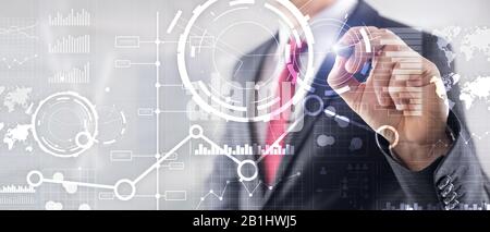Business interface mixed media double exposure financial chart graph diagram and icon on virtual screen. Innovation concept. Stock Photo