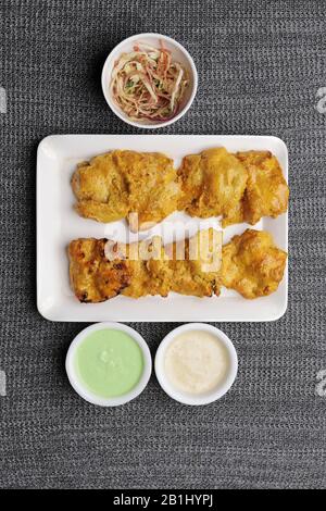 Chicken kabab, marinated with a range of spices and shallow fried Stock Photo