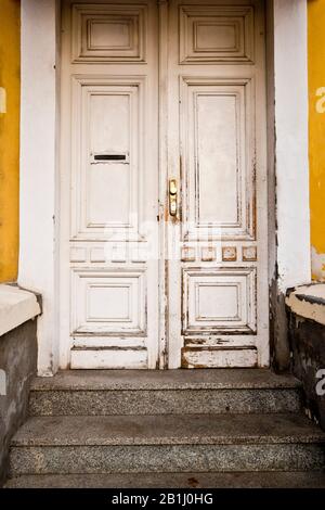 old closed white door Stock Photo