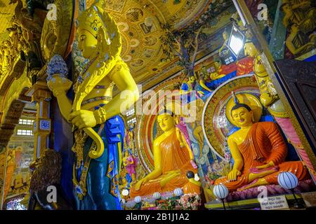 Colombo, Sri Lanka - February 2020: Buddha statue in the Gangaramaya Temple on February 3, 2020 in Colombo, Sri Lanka. Stock Photo