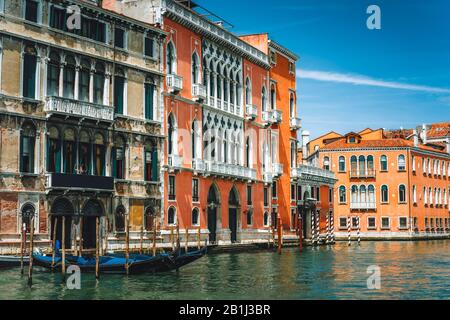 Old ancient facades of houses on Grand Canal, Venice, Italy. Vintage hotels and residential buildings in the Venice center. Historical architecture of Stock Photo