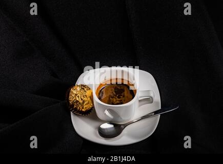 Coffee and candy isolated Stock Photo