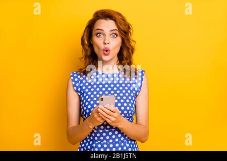 Portrait of her she nice attractive lovely amazed girlish addicted cheerful cheery wavy-haired girl using cell plump pout lips reaction isolated on Stock Photo
