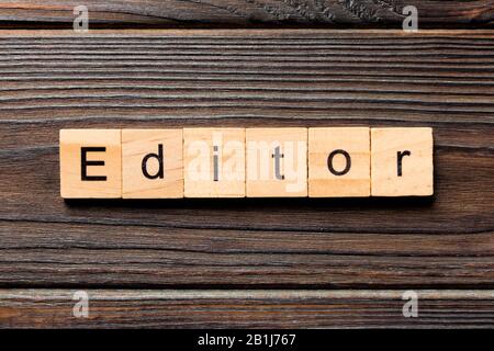 editor word written on wood block. editor text on table, concept. Stock Photo