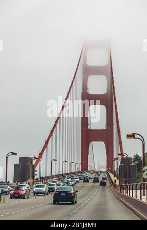 Driving on the Golden Gate bridge in the fog , San Francisco Stock Photo