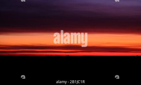 Sunrise over the village on an early frosty morning Stock Photo