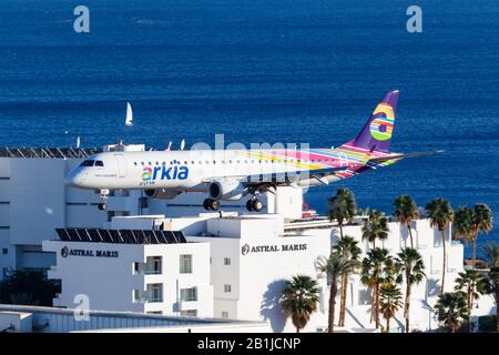 Eilat, Israel – February 19, 2019: Arkia Embraer 195 airplane at Eilat Airport (ETH) in Israel. Stock Photo