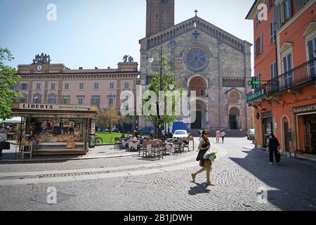 The car-free historic centre of Piacenza, with many bicycles and pedestrians. Piacenza, Italy - april 2019 Stock Photo