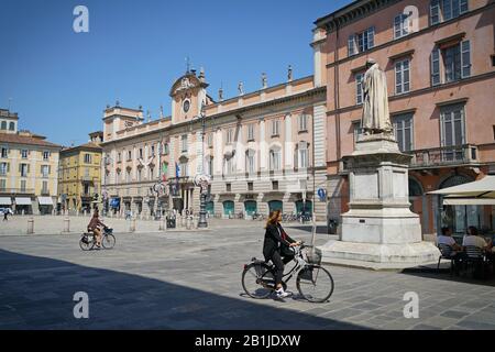 The car-free historic centre of Piacenza, with many bicycles and pedestrians. Piacenza, Italy - april 2019 Stock Photo