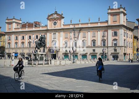 The car-free historic centre of Piacenza, with many bicycles and pedestrians. Piacenza, Italy - april 2019 Stock Photo