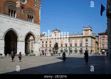 The car-free historic centre of Piacenza, with many bicycles and pedestrians. Piacenza, Italy - april 2019 Stock Photo