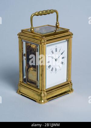 Antique Carriage Clock, Classic French Timepiece,  on Grey Background Stock Photo