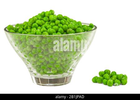 Fresh green peas in bowl isolated on white. Stock Photo