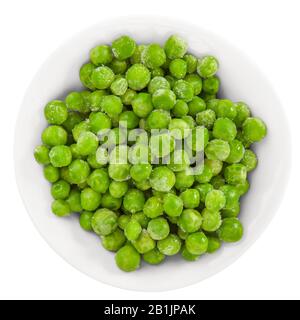 Frozen green peas in bowl on white. Top view.  Isolated with clipping path. Stock Photo