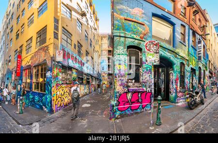 Tourists exploring the Graffiti filled alley ways, Hosier Street, Melbourne Lanes, Melbourne, Victoria, Australia Stock Photo