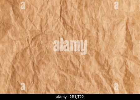 https://l450v.alamy.com/450v/2b1jt22/top-view-of-used-brown-baking-paper-with-rough-folds-and-bends-abstract-trendy-culinary-cooking-texture-background-2b1jt22.jpg