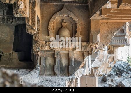 India-Kondana Caves- A low relief votive stupa in an arch on the right side of the verandah of the Vihara adjacent to the Chaitya hall. Stock Photo