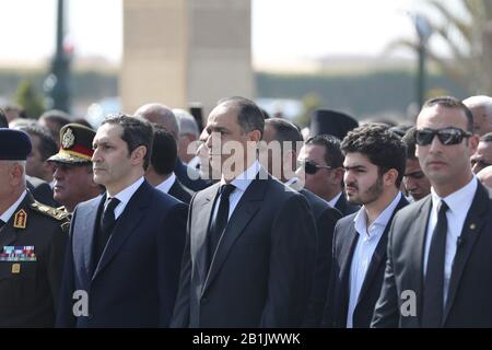 Cairo, Egypt. 26th Feb, 2020. Alaa Mubarak (2nd L) elder son of former Egyptian President Hosni Mubarak, and his brother Gamal (C) take part in Mubarak's military funeral at El-Mosheer Tantawy mosque. Mubarak, who ruled Egypt for three decades, died on Tuesday in a Cairo hospital aged 91. Credit: Gehad Hamdy/dpa/Alamy Live News Stock Photo