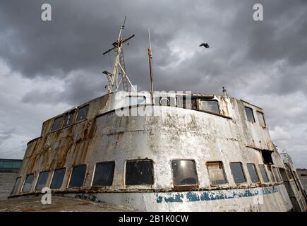 The Royal Iris Ferry now derelict and moored on the Thames Stock Photo