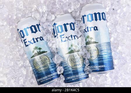 IRVINE, CALIFORNIA - MARCH 29, 2018: Corona Extra beer king cans in ice. Corona is the most popular import in the USA. Stock Photo