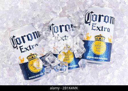 IRVINE, CALIFORNIA - MARCH 29, 2018: Corona Extra beer cans in ice. Corona is the most popular import in the USA. Stock Photo