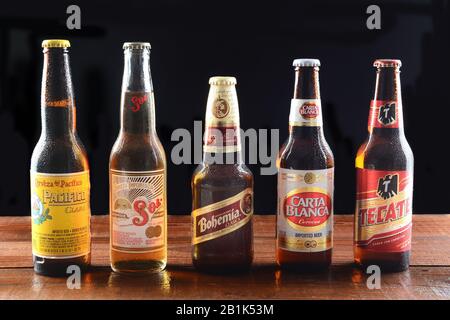 IRVINE, CA - JUNE 18, 2015: Five Mexican Beers. Pacifico, Carta Blanca, Tecate, Sol, and Bohemia are five of the most popular Mexican beers imported i Stock Photo