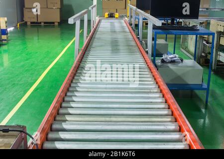 roller conveyor, Production line conveyor roller transportation objects. Stock Photo