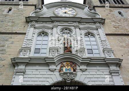 Lucerne, Switzerland - June 26, 2016. Facade of Church of St. Leodegar (Hofkirche St. Leodegar) in Lucerne, Switzerland, with religious statues and ch Stock Photo